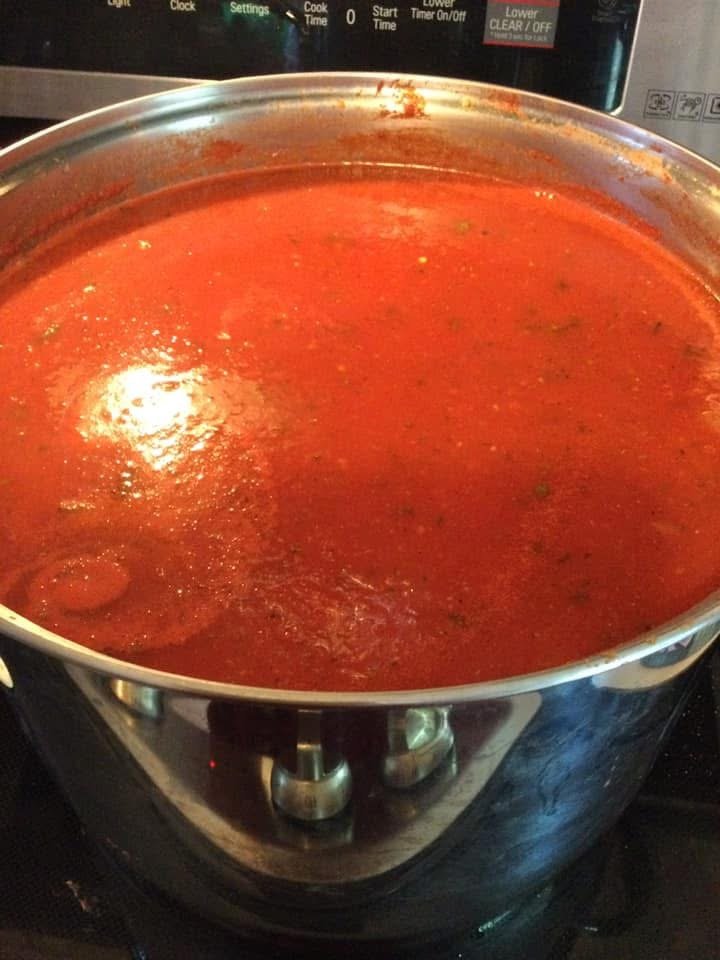 Homemade red sauce simmering for family dinner